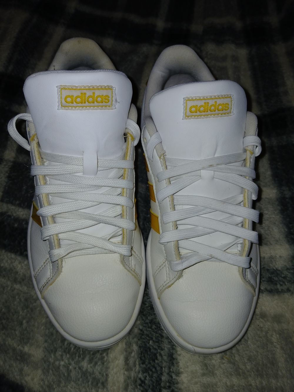 Adidas White Sneakers with Yellow Accent Stripes